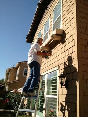 Michael thinking outside the box to hang some string/globe lights