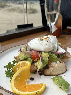 Poached eggs on avocado toast.