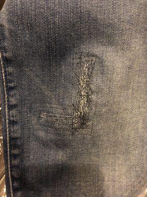 This is how they sewed up a straight rip in my $200 Mother jeans...