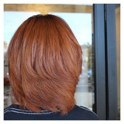 Auburn hair color and layered hair cut