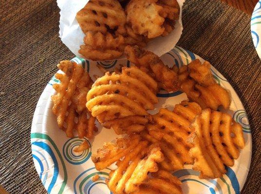 No longer have curly fries. Waffle fries w curly fry seasoning now.