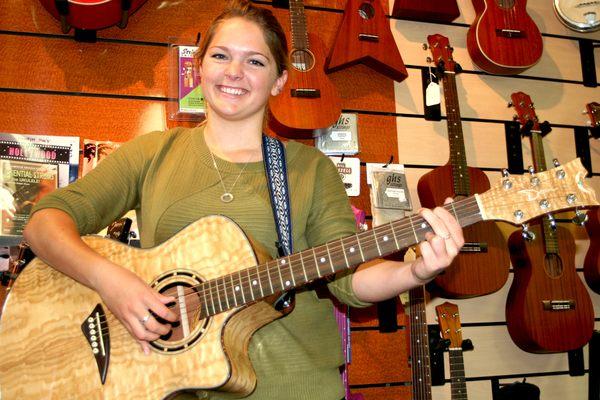 Girl playing guitar