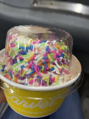 Junior size vanilla soft serve w/ rainbow sprinkles $4.89ish