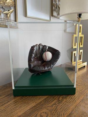 Restored baseball glove in cupola.