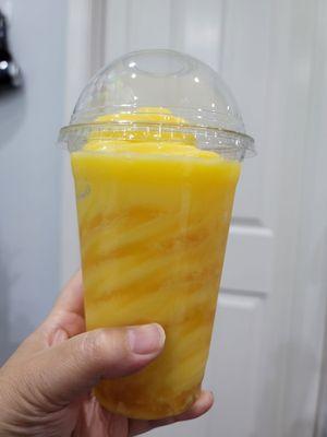 Dole whip float. The POG (pineapple, orange, guava) juice made some parts of the sherbert icy. Not recommended as a float.