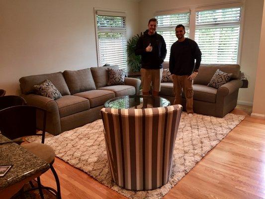 Ryan and Leo pose for the camera after ensuring our room matched the designer's plan.