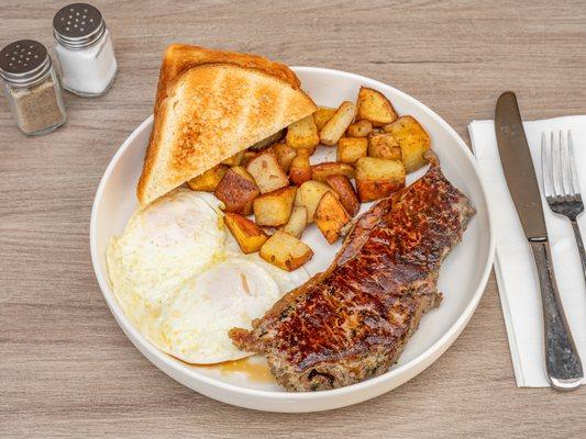 Steak & Eggs.

NY steak, two eggs any style, choice of hash brown or roasted potatoes & toast.