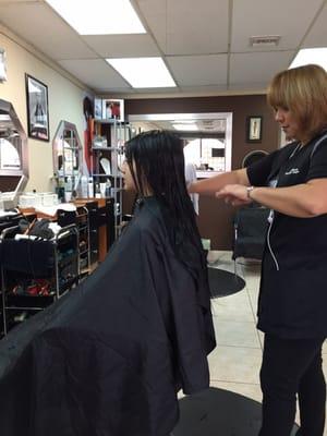 My oldest girl cutting her hair