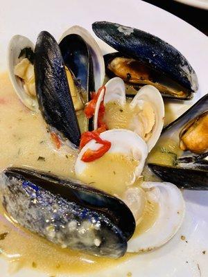 Mussels & Clams White wine, butter, garlic, roasted peppers, parsley and LOVE.