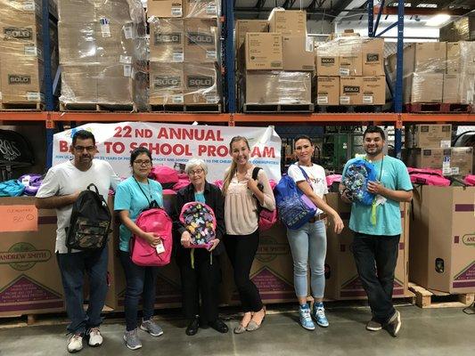 FORTIS & Friends volunteering with Share Ourselves annual back pack drive in 2017.