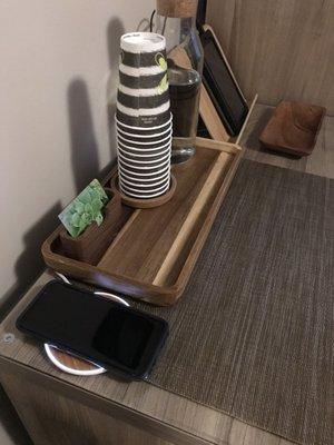 Water and phone charging station in the room. So thoughtful!