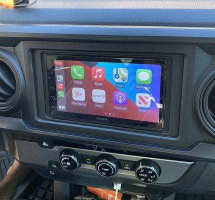 Me wood with Apple CarPlay in 2017 Toyota Tacoma