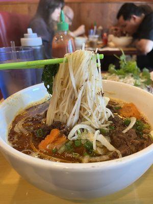 #15 of Bun Bo Hue which is a spicy broth with beef and pork