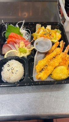 Sashimi bento box with tempura.