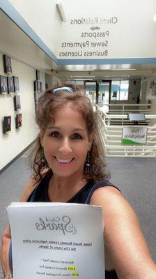 Julie A with a business license packet from Sparks City Hall. Thank you Alyssa, Client Relations.