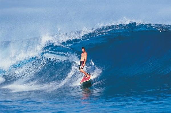 Zack surfing in Maui.