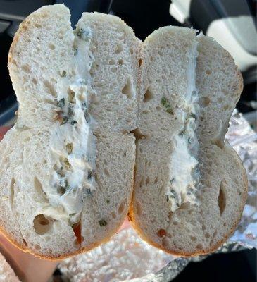 Sesame bagel with scallion cream cheese