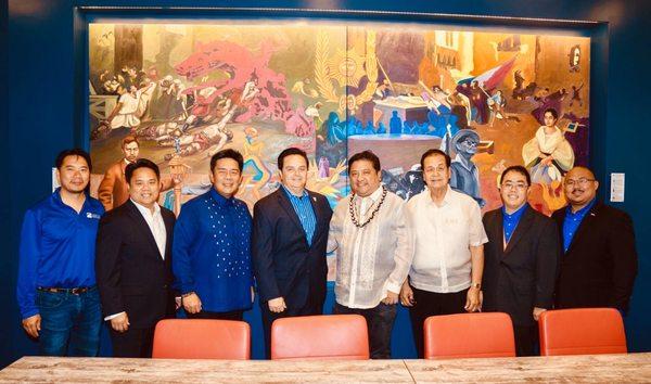 Mabuhay CU and  Carson Community Leaders with Artist Eliseo Silva (Center)