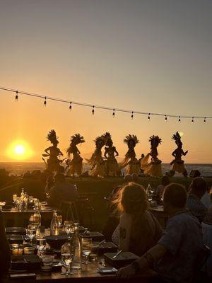 Tahitian dancers at sunset