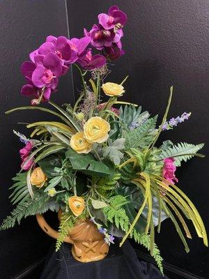 All our silk arrangements are made as one-of-a-kind arrangement. Visit our website to see which ones are still available to purchase today.