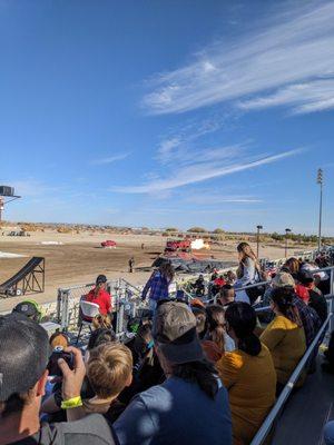 Fans watching a monster fire truck blow fire!