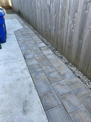 New pavers along existing concrete walkway.