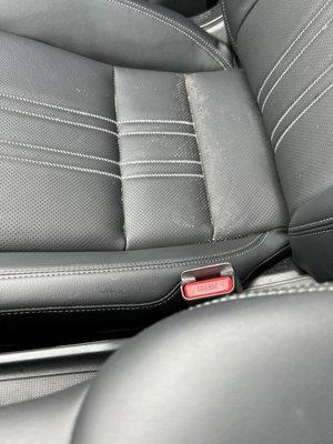 Leather seat with spilled soup