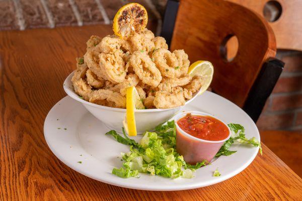 Fried Calamari! Crispy, tender and full of flavor.