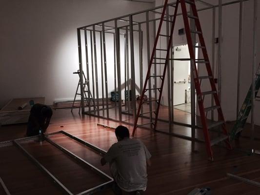 Framing metal walls 10 feet high and 40 linear feet long for an ART Exhibit for UCI MFA thesis project.