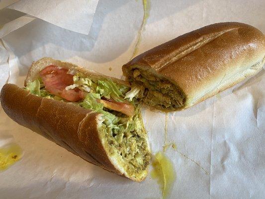 Curry chicken with hot peppers, lettuce, tomato, provolone and a touch of mayo.