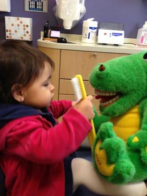 17 month old enjoying the dentist.