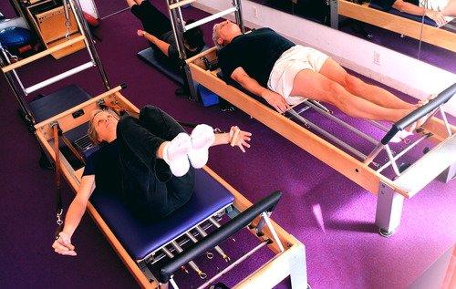 All our Pilates is machine based: reformers, the Cadillac, Wundachair, Tower, and Barrel, with Mat elements.