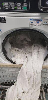 Clothes soaking wet with bleach and soap