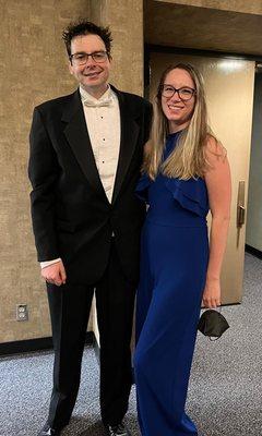 Maestro (as of 2020)! Geoffrey Pope and professional violinist, LIzzy Dickinson (who is also Dr. Pope's wife)