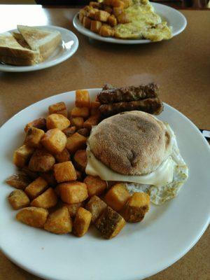 Sausage Egg and Cheese English Muffin with a side of Sausage.