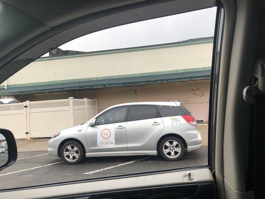 Car with sign  - for delivery