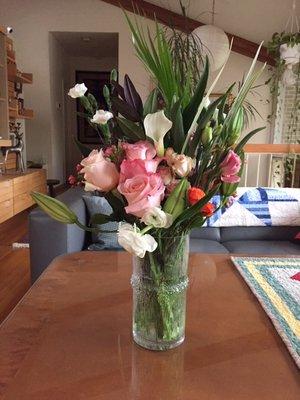 Birthday flowers in the vase fixed by Reston Glass