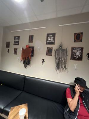 Waiting room seating and Halloween wall decors