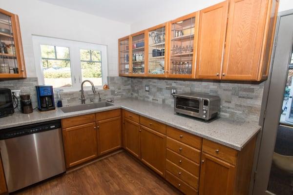 Primary work L with the sink and long counter.  Joe fabricated the counters and installed the tile backsplash