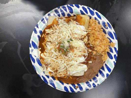 Enchilada plate with rice and beans ($11.99 USD)