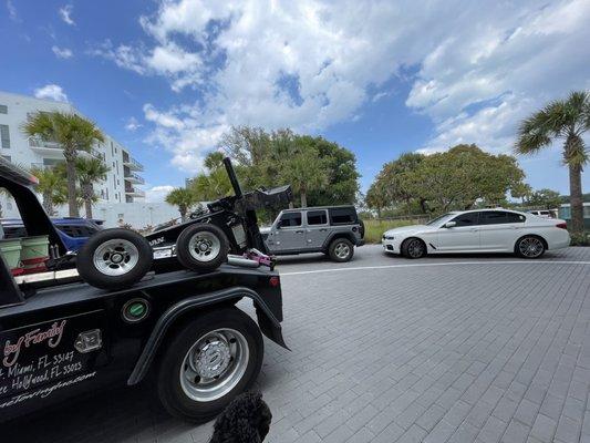 The towing company leaving after manager interrupted and as you can see all the cars stayed there