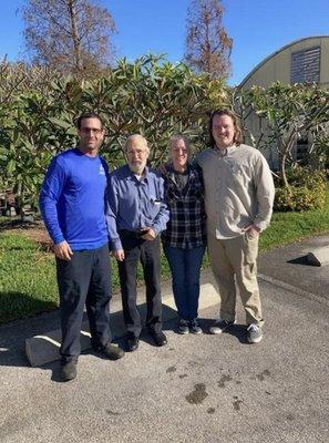 Pictured: Dan from A+ Lawn and Pest control, David Sr., President Kathleen Govan and her son Mark Jr.