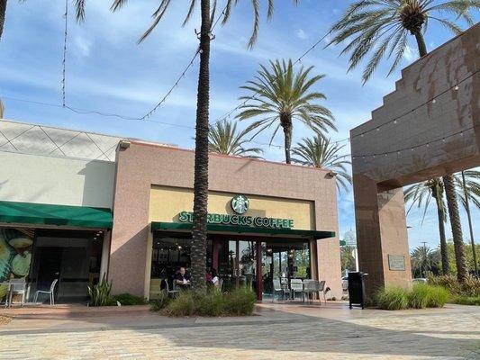 View of Starbucks while sitting outside enjoying our drinks.