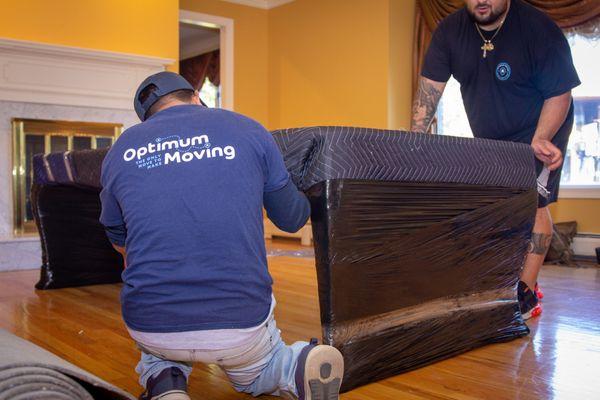 Wrapping an antique dining table for safe transit