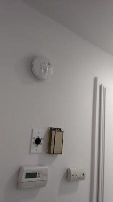 Hall way residential detectors monoxide carbon installations.