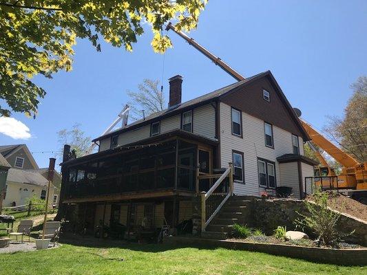 Crane removing the trees on the left side.