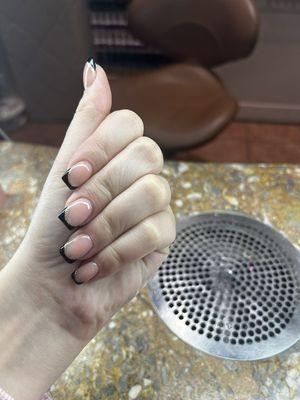 My niece got a beautiful black french tip set ‍