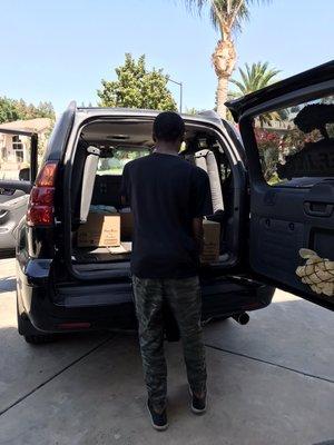 Loading bread, bagel & pastries to be delivered to Modesto Gospel Mission.