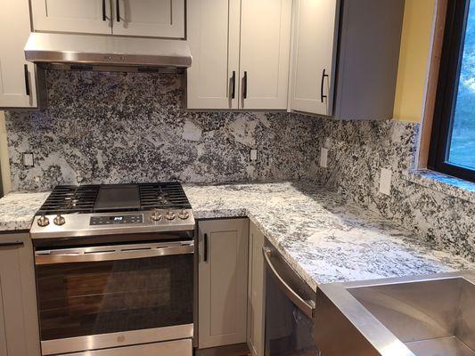 Granite counter and backsplash