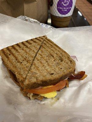 Bacon egg and pepper jack cheese with red onions, tomatoes  with chipotle mayo